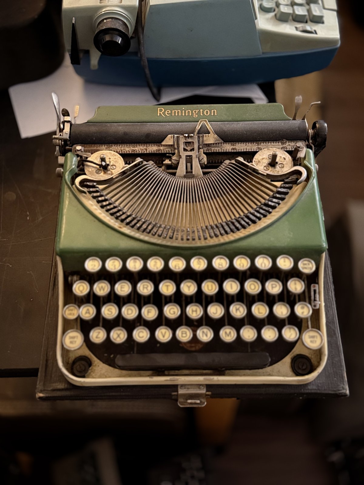 A hunter-green Remington typewriter, an uncommon color for the model.